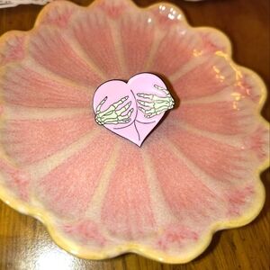 Pink heart bosom but with skeleton hands enamel pin backpack clothes hat bag cap